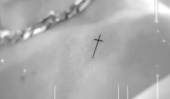 Selena Gomez cross tattoo